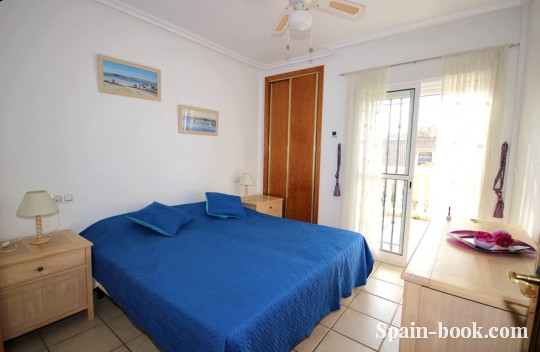 Таунха́ус Таунхаус с видом на коммунальный бассейн в Кабо Роиг / Ориуэла Коста, Коста Бланка, Кабо Роиг